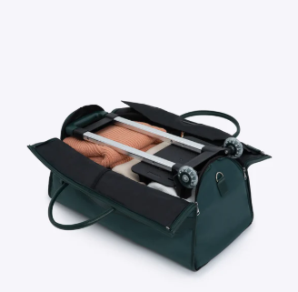 Vintage green rolling duffel bag