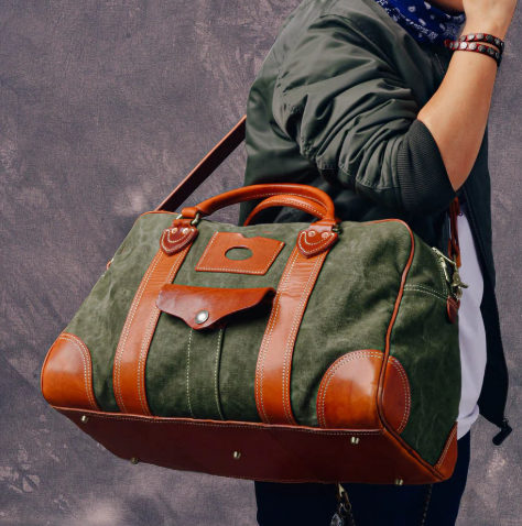 Large weekend travel bag in a combination of canvas and Italian leather