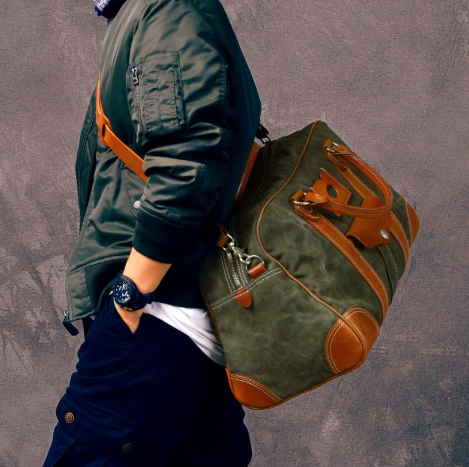 Large weekend travel bag in a combination of canvas and Italian leather