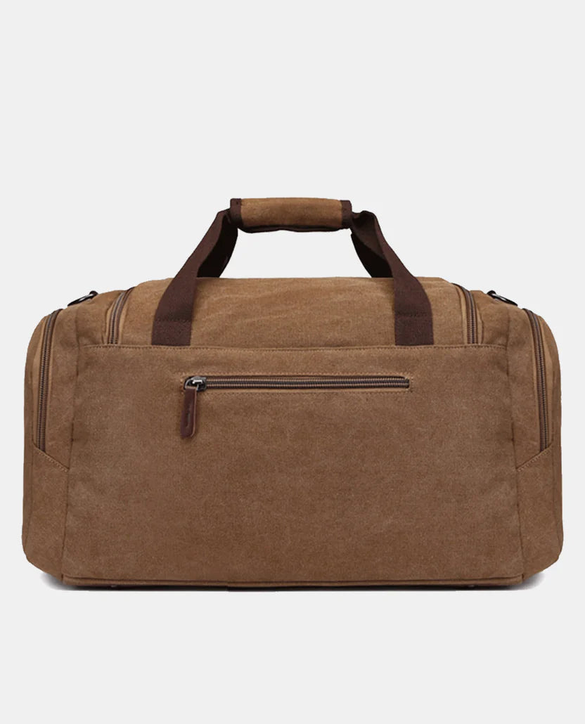 Water-resistant canvas travel bag—large weekend bag with leather trim