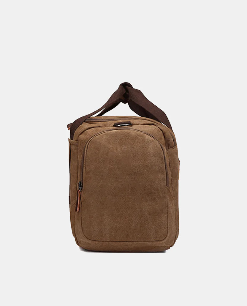 Water-resistant canvas travel bag—large weekend bag with leather trim
